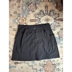 Athleta Salutation Stash Pocket Skort Black Athletic Skirt Tennis Yoga Outdoor L